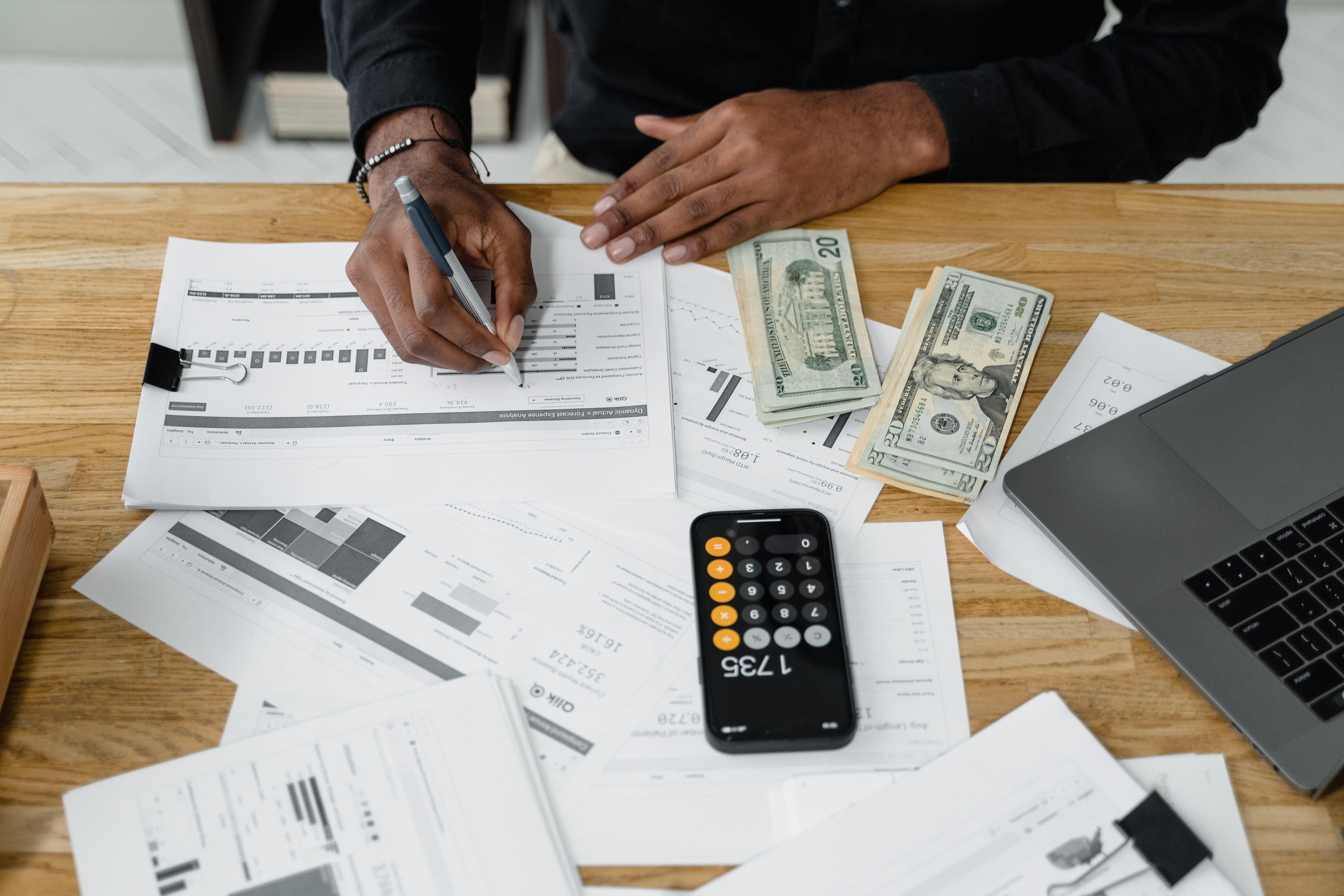 Ledgers and financial statements prepared for review.